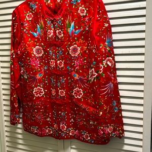 Just in time for Christmas festivities. This gorgeous silk jacket. Embroidered.